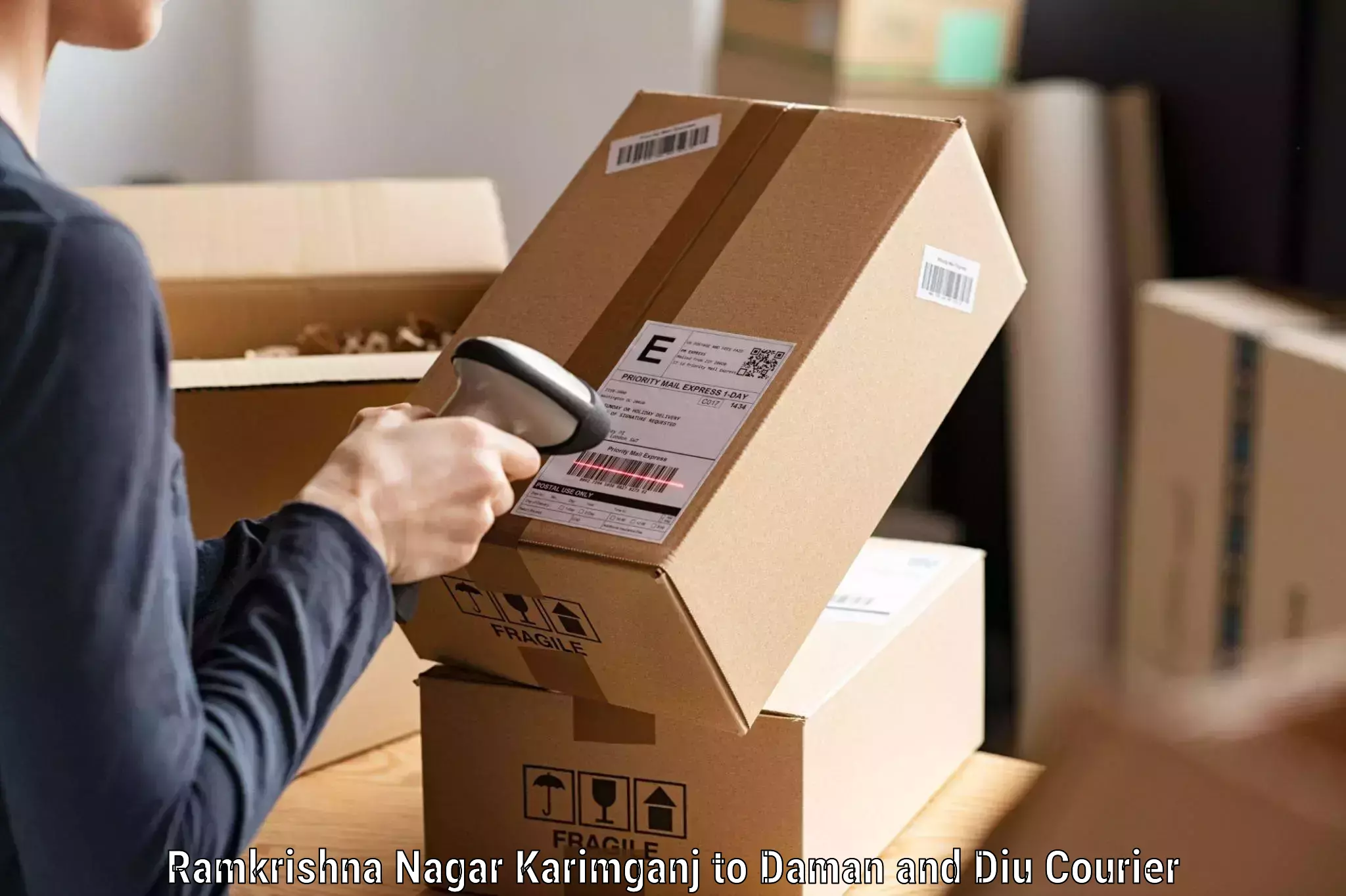 On-call courier service Ramkrishna Nagar Karimganj to Daman