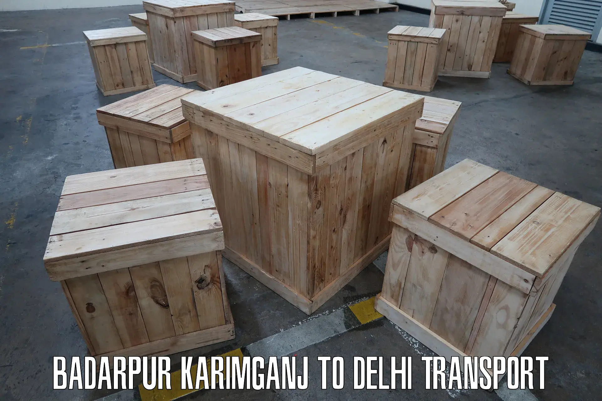 Two wheeler parcel service Badarpur Karimganj to NIT Delhi