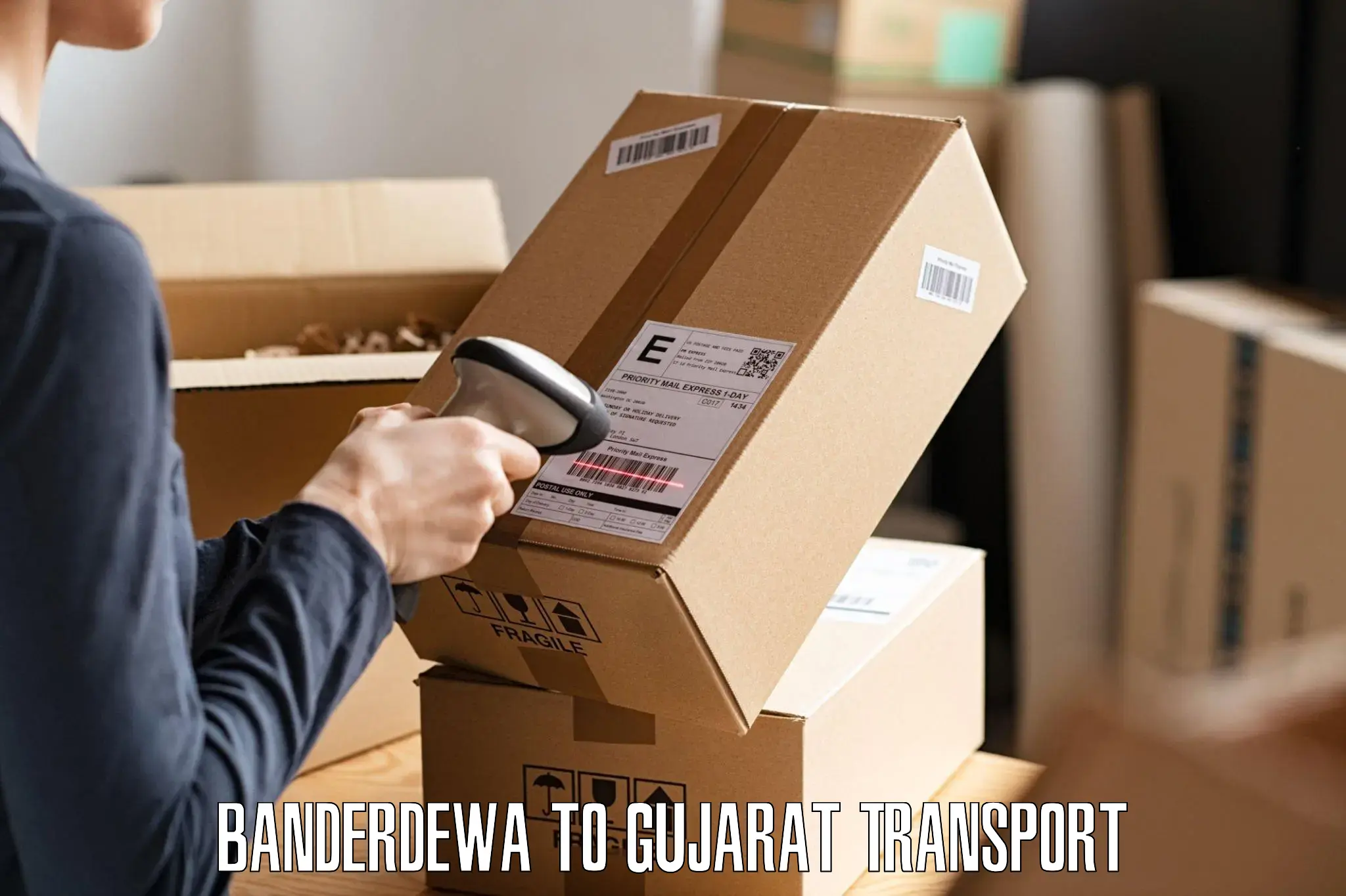 Two wheeler parcel service Banderdewa to Anand