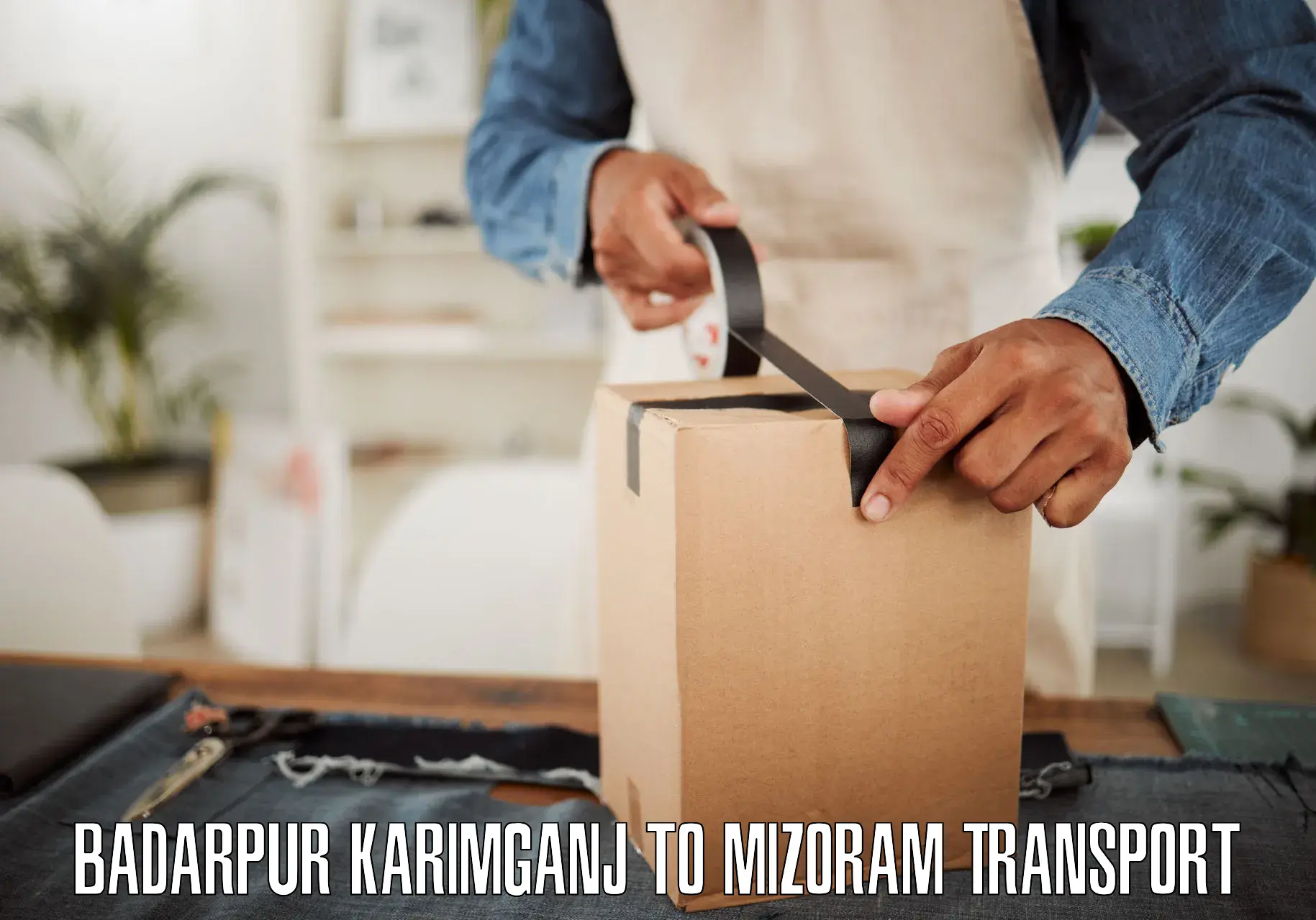 Two wheeler parcel service Badarpur Karimganj to Saitual