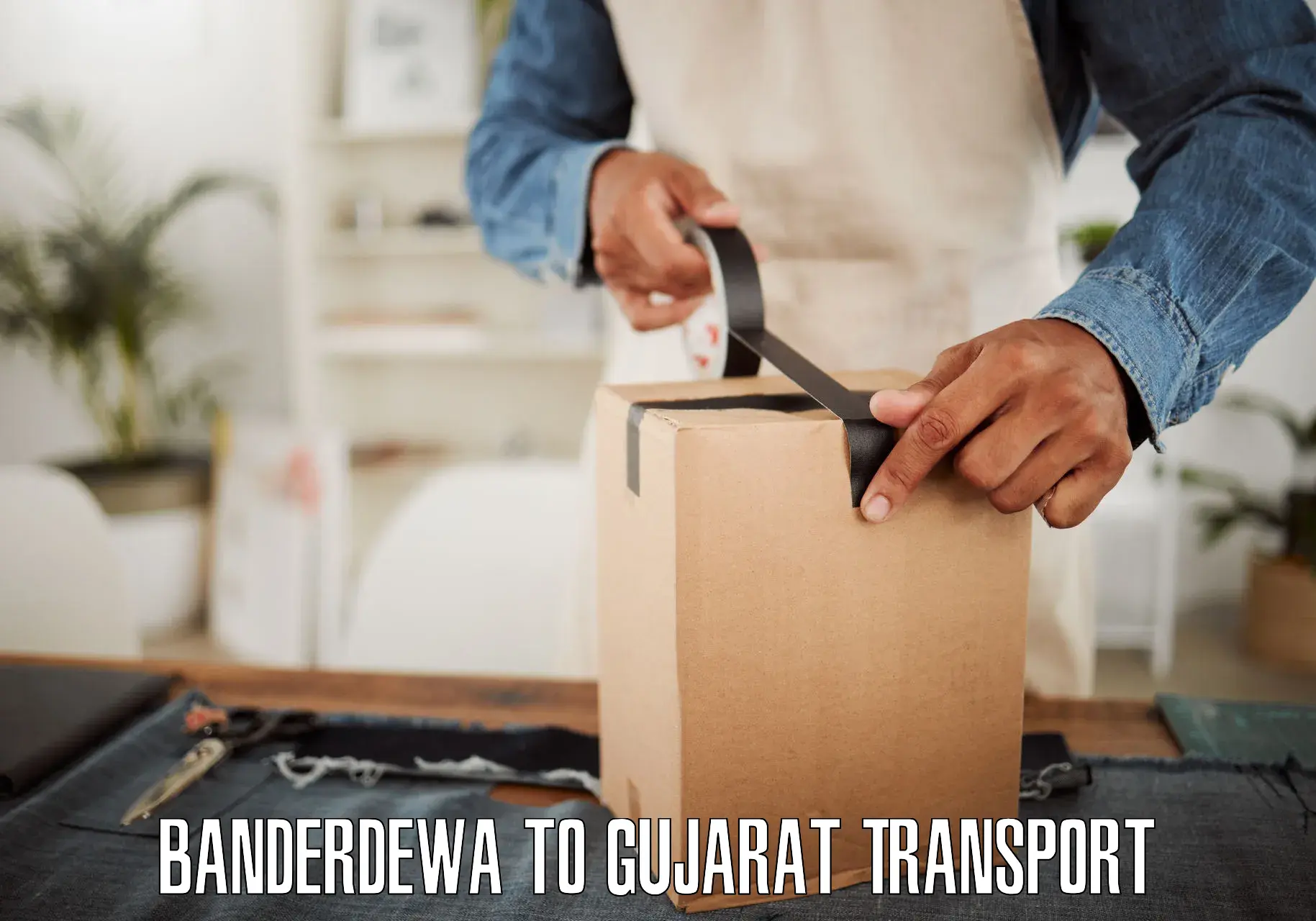 Two wheeler transport services Banderdewa to Gandhinagar